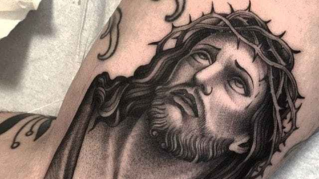 black grey jesus tattoo