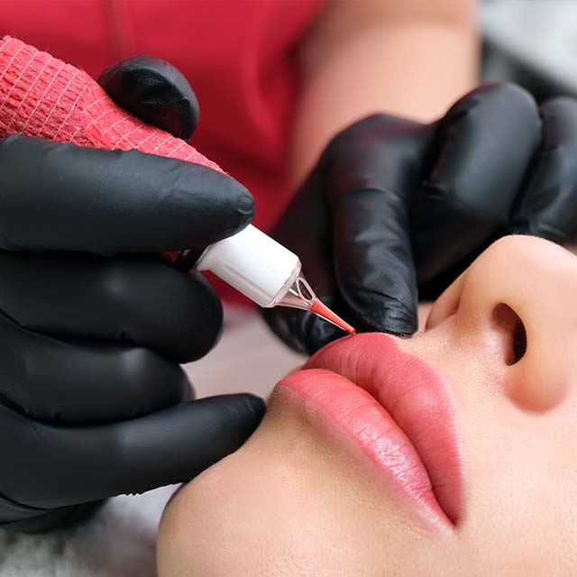 tattoo artist tattooing permanent lip liner