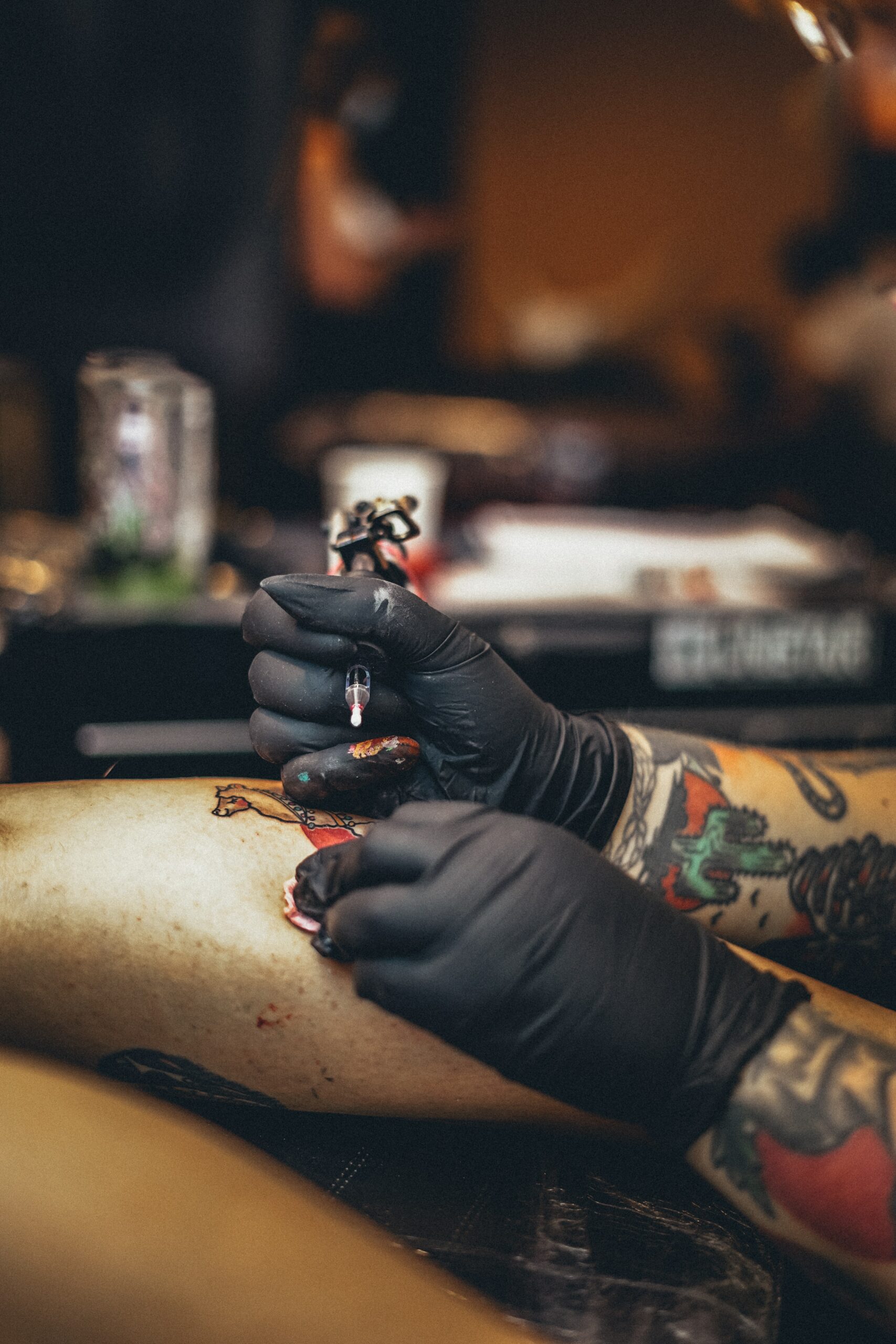 hand-tattoo tattoo apprentice working to become a tattoo artist