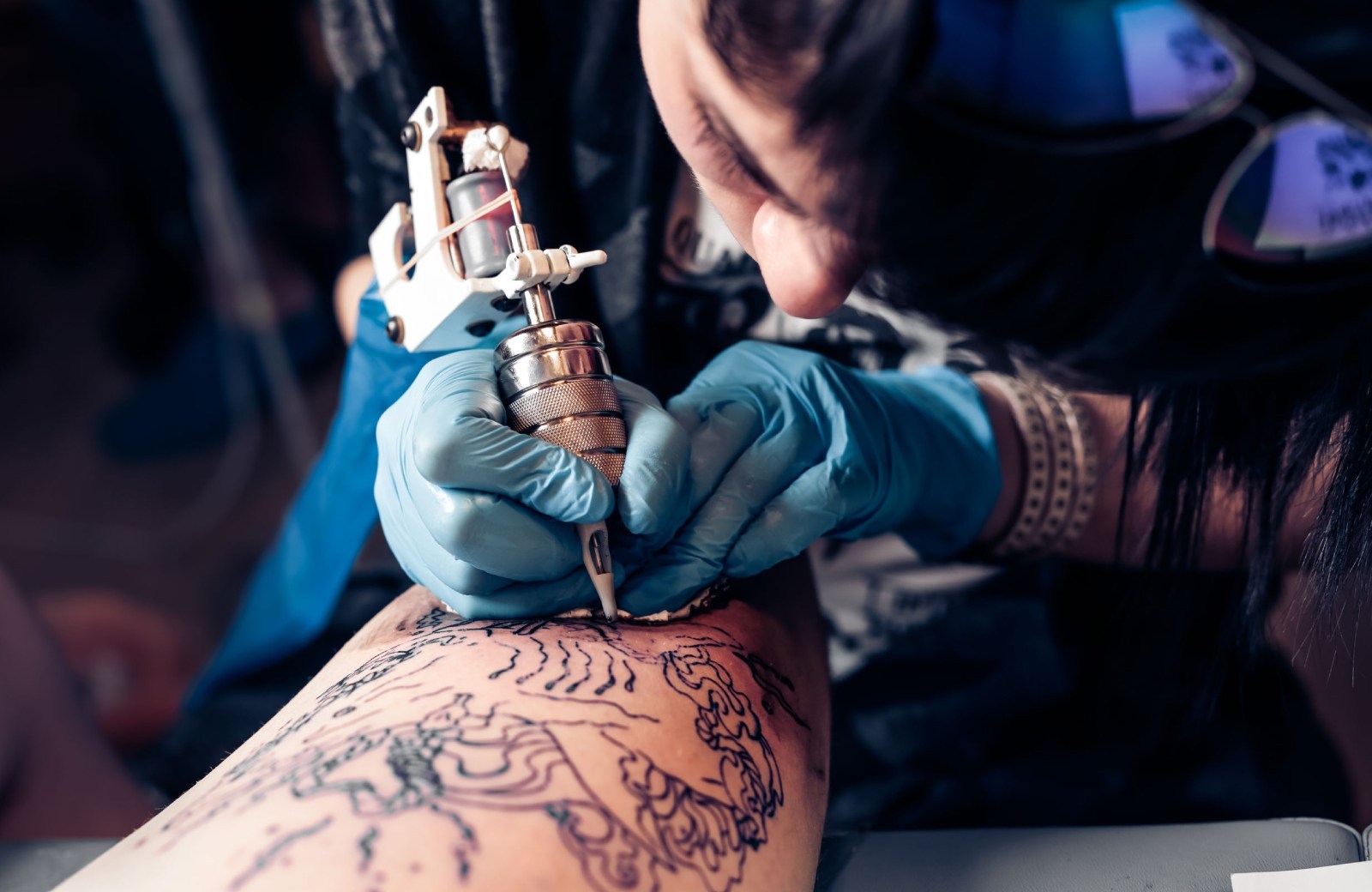 tattoo artist at work