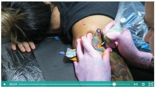 tattoo artist using a tattoo tattoo apprenticeship program alternative
