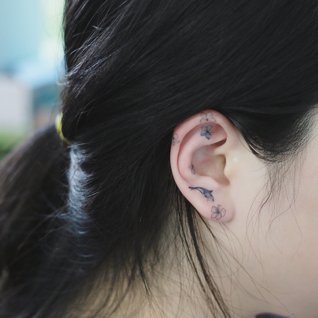 Delicate flower tattoo delicate flower tattoo on ear