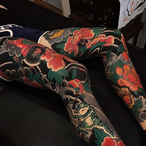 body covered in tattoos leg tattoos