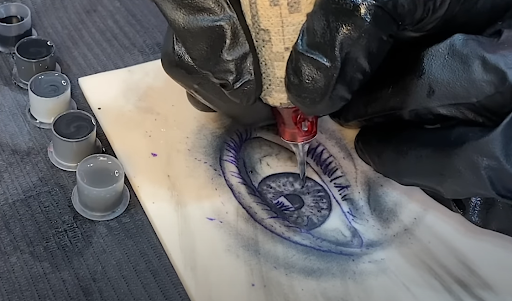 eye tattoo realism design on tattoo practice skin