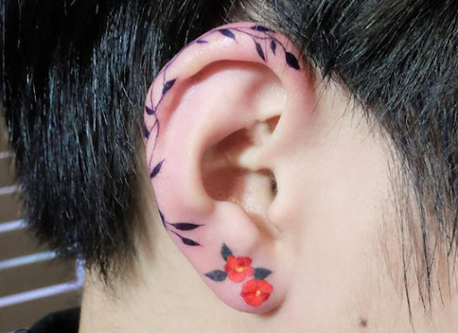flower jewelry tattoo optical illusion ear tattoo to look like flower jewelry