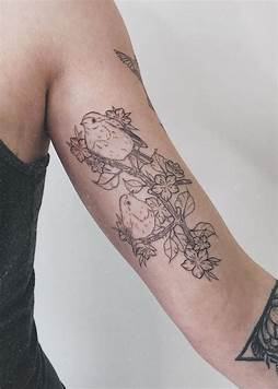 Inner bicep bird tattoo Inner bicep bird tattoo made with very fine lines