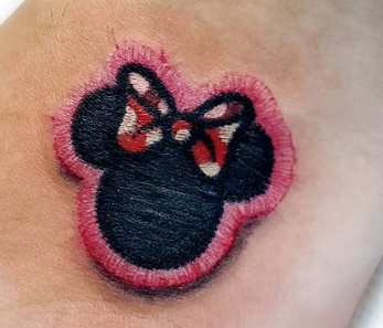 Minnie Mouse patch tattoo Minnie Mouse patch tattoo by Russell Van Schaick
