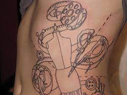 Seamstress tattoo Seamstress tattoo