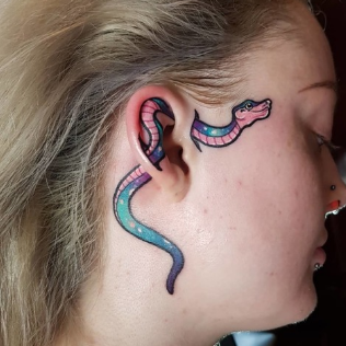 snake ear tattoo snake tattoo behind the ear