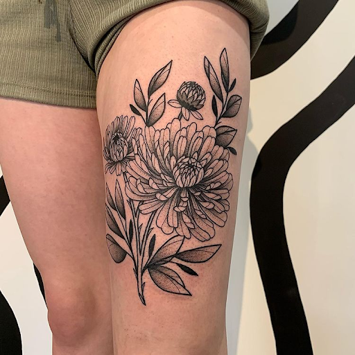 tattoo on thick skin of thigh