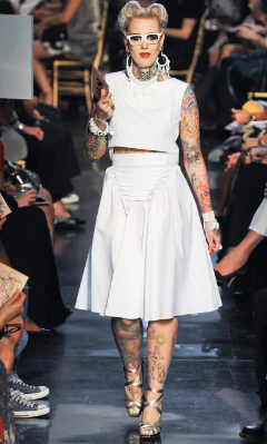 tattooed model walking runway tattooed model walking runway