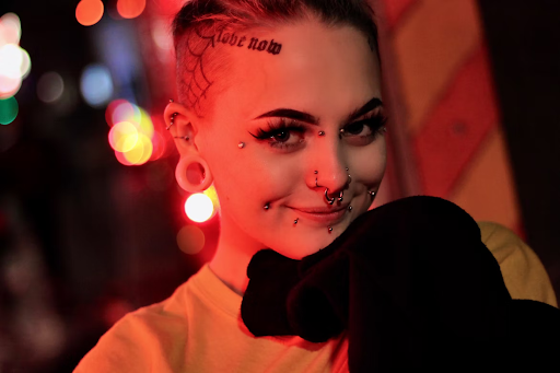 woman with body piercings woman with body piercings